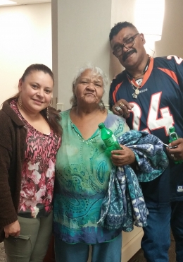 Luz Cordero with her son and social worker Zaida Martinez